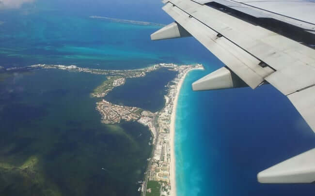 Tempo en avión hasta Cancún